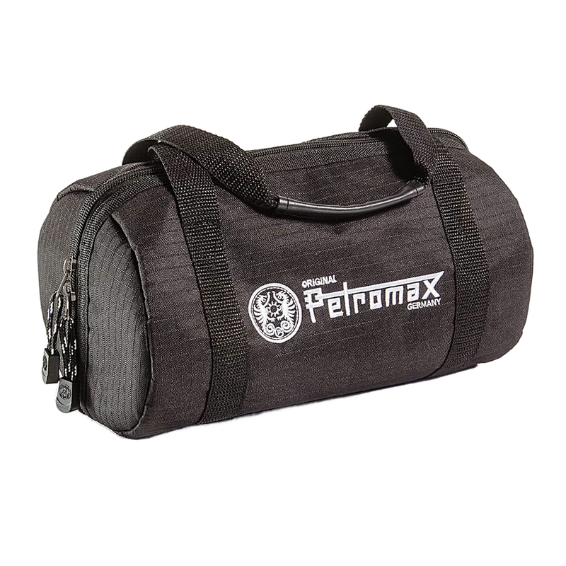 Compact black ripstop transport bag with durable handles and zippered closure, designed for secure packing, featured in Kitchen & Food, Cookware, Cast Iron, and Best Sellers collections.