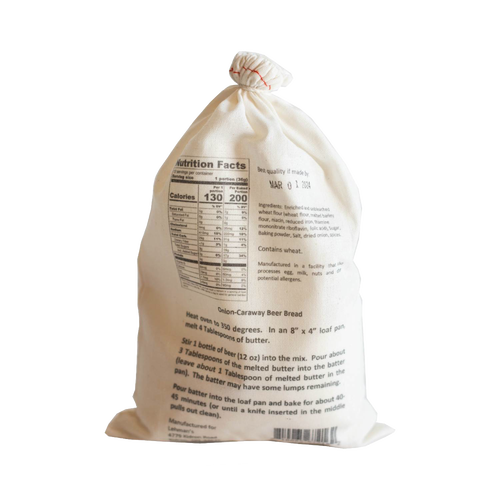 Soft fabric drawstring bag with handcrafted bread mix in choice of flavors, displaying baking instructions and nutrition facts, ideal for Kitchen & Food, Pantry, Dry Goods and Mixes, and Best Sellers collections.