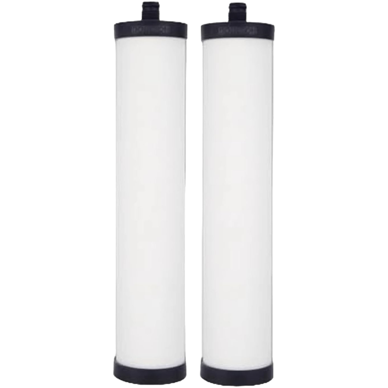 Pair of white cylindrical ceramic water filter elements with black end caps, designed to reduce chlorine, bacteria, cysts, sediment, and heavy metals, ideal for appliances and emergency supplies.