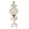 Handcrafted clear glass oil lamp with intricately sculptured base and frosted chimney, featuring a heavy brass-plated burner, perfect for Lamps & Lighting, Oil Lamps, Table Lamps, Best Sellers, and Promo Eligible collections.
