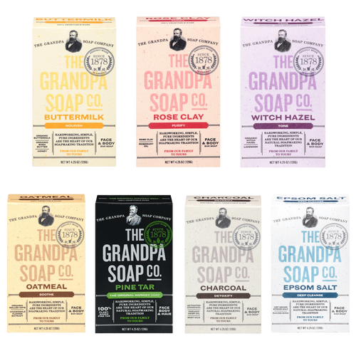 Seven handcrafted soap bars in vintage-inspired boxes labeled Buttermilk, Rose Clay, Witch Hazel, Oatmeal, Pine Tar, Charcoal, and Epsom Salt, ideal for Health & Wellness, Grooming and Personal Hygiene, Soaps and Soapmaking, USA Made, Best Sellers, and Promo Eligible collections.