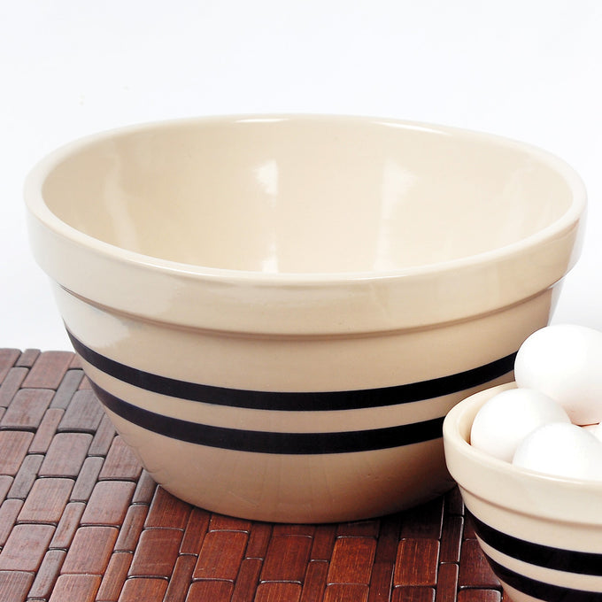 Handcrafted USA-made stoneware shoulder bowl with classic black stripes, durable and ideal for mixing, baking, serving, and part of Kitchen & Food, Cookware, and Storage collections.
