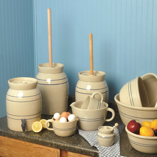 Collection of handcrafted stoneware kitchenware in natural stone color with classic double blue stripes, featuring butter churns with smooth wooden dashers and mixing bowls, part of Kitchen & Food, Specialty Equipment, Making Butter, USA Made, Best Sellers, and Promo Eligible collections.