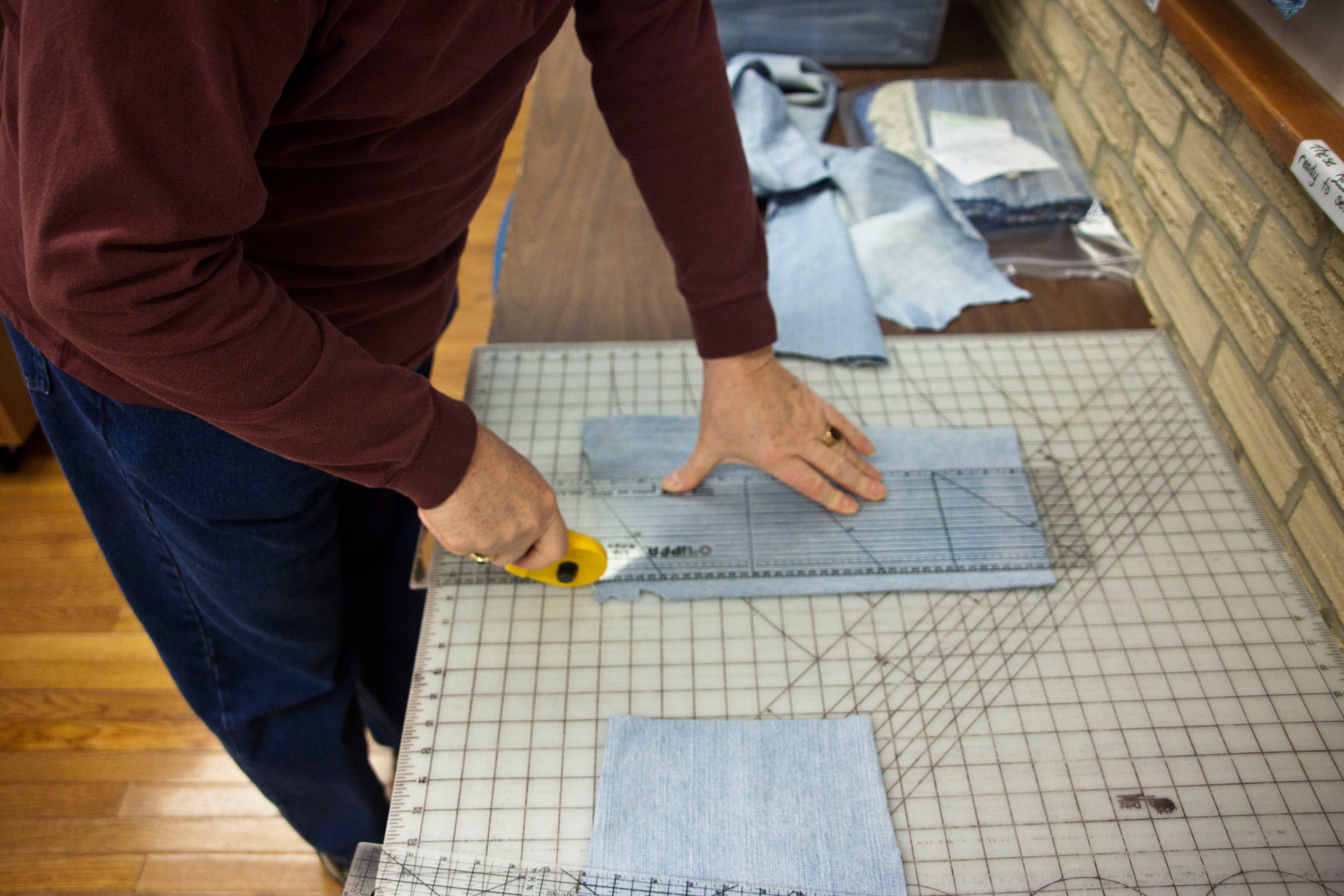 The flat pieces are cut up into squares to make denim comforters. The extra "scraps" are then cut into strips for make the rugs.