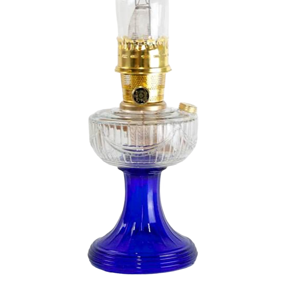 Handcrafted vintage-style oil lamp featuring a clear glass font with cobalt blue base and brass trim, ideal for Lamps & Lighting, Oil Lamps, Table Lamps, and Best Sellers collections.