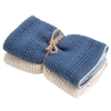 Two loosely woven cotton kitchen towels in blue and natural colors, tied with rustic twine, made in USA and featured in Kitchen & Food, Kitchen Textiles, Best Sellers, and Promo Eligible collections.
