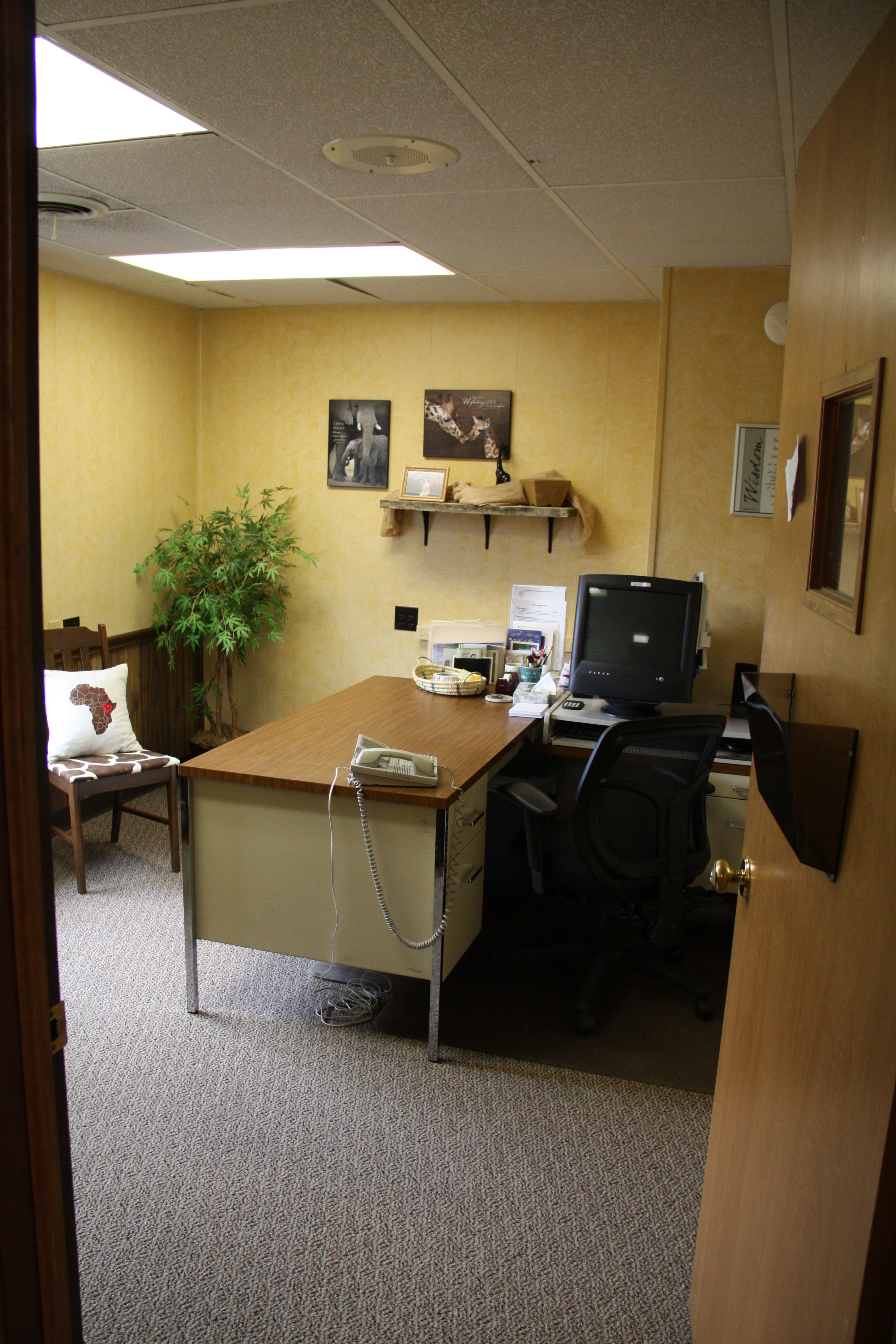 ...into a lovely workspace, with warm color on the walls...