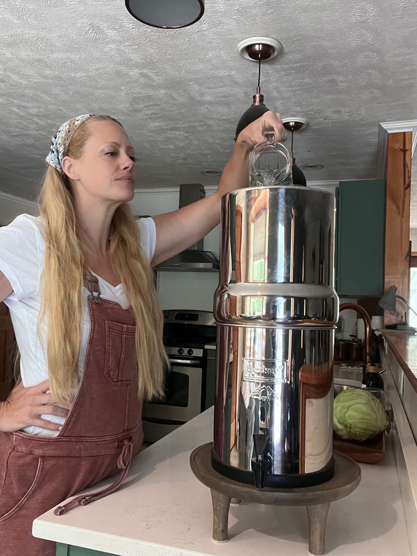 Sarah filling Berkey water filter
