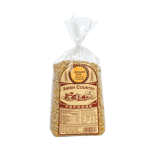 Clear plastic bag filled with small, golden ladyfinger popcorn kernels labeled Amish Country with a vintage-style brown design, featured in Kitchen & Food and Snacks and Sweets collections.