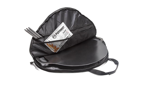 Black round carrying bag with padded interior and mesh pocket, designed for safe transport and storage of griddles and fire bowls, suitable for camping and outdoor use.