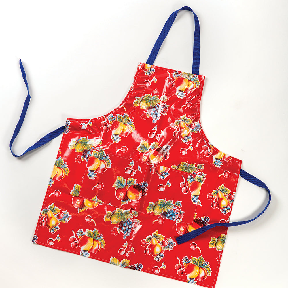 Handcrafted vinyl apron in vibrant red with colorful retro fruit prints, featuring adjustable blue straps and two large pockets, ideal for Kitchen & Food and USA Made collections.