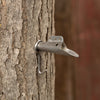 Heavy-duty stainless steel spout with a hook, inserted into a tree for sap collection, ideal for Farm, Garden & Tool, Orchard and Grove, Maple Syrup Sugaring Supplies, and Promo Eligible collections.