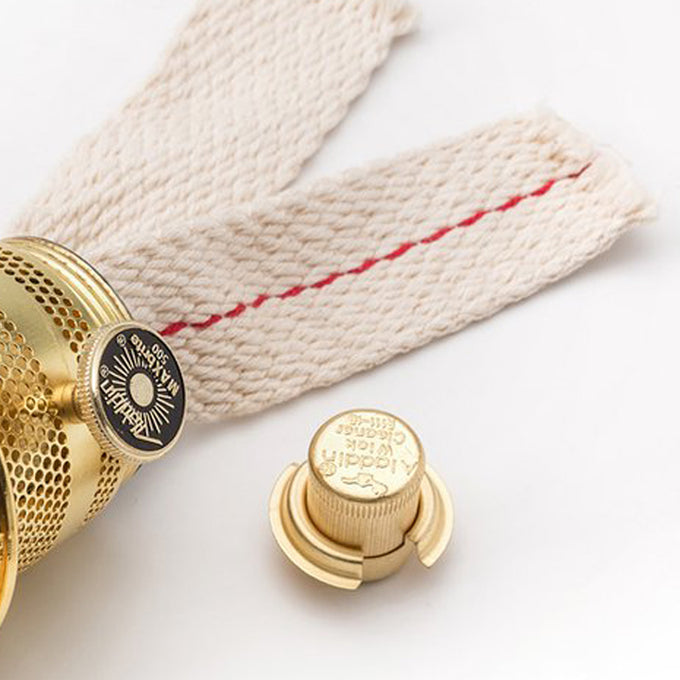 Polished brass lamp burner with woven cotton wick featuring a brass adjustment knob and a removable brass collar, included in Lamps & Lighting, Parts and Accessories, Lamp Burners and Collars, Best Sellers, Promo Eligible collections.