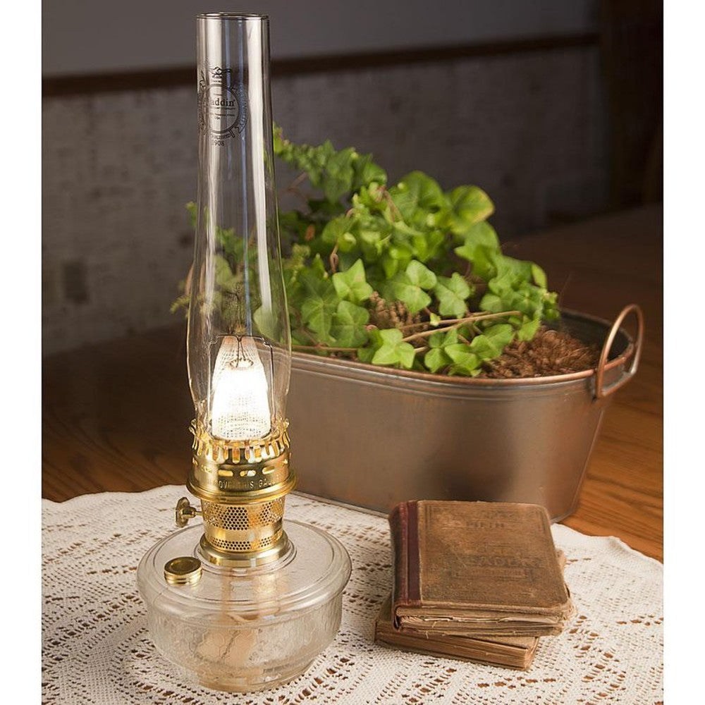 Unique handcrafted clear oil lamp with polished brass burner and tall glass chimney, ideal for bright space-saving lighting in Farm, Garden & Tool, Lamps & Lighting, and Emergency Supplies collections.