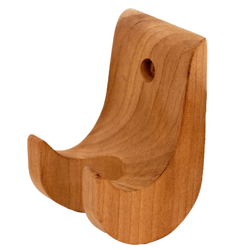 Handcrafted unfinished cherry wood holder with smooth curves and mounting hole, designed for displaying Amish-made noodle cutter, fitting Kitchen & Food, Food Prep, and USA Made collections.