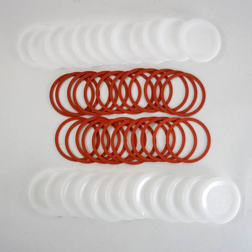 Handcrafted reusable white plastic canning jar lids and red sealing rings designed for regular mouth jars, made in USA, ideal for Kitchen & Food, Food Preservation, and Canning collections.