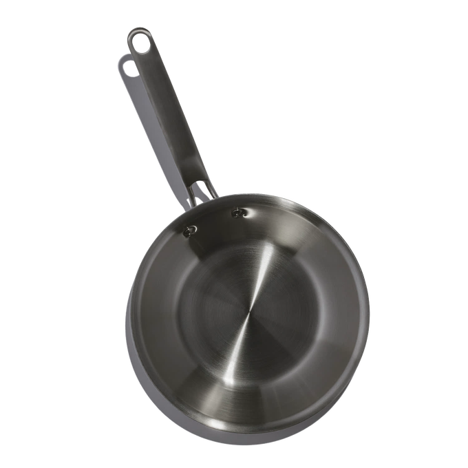 Top-down view of a handcrafted fully clad stainless steel fry pan with riveted handle, designed for even heat distribution, featured in Kitchen & Food, Cookware, and Best Sellers collections.