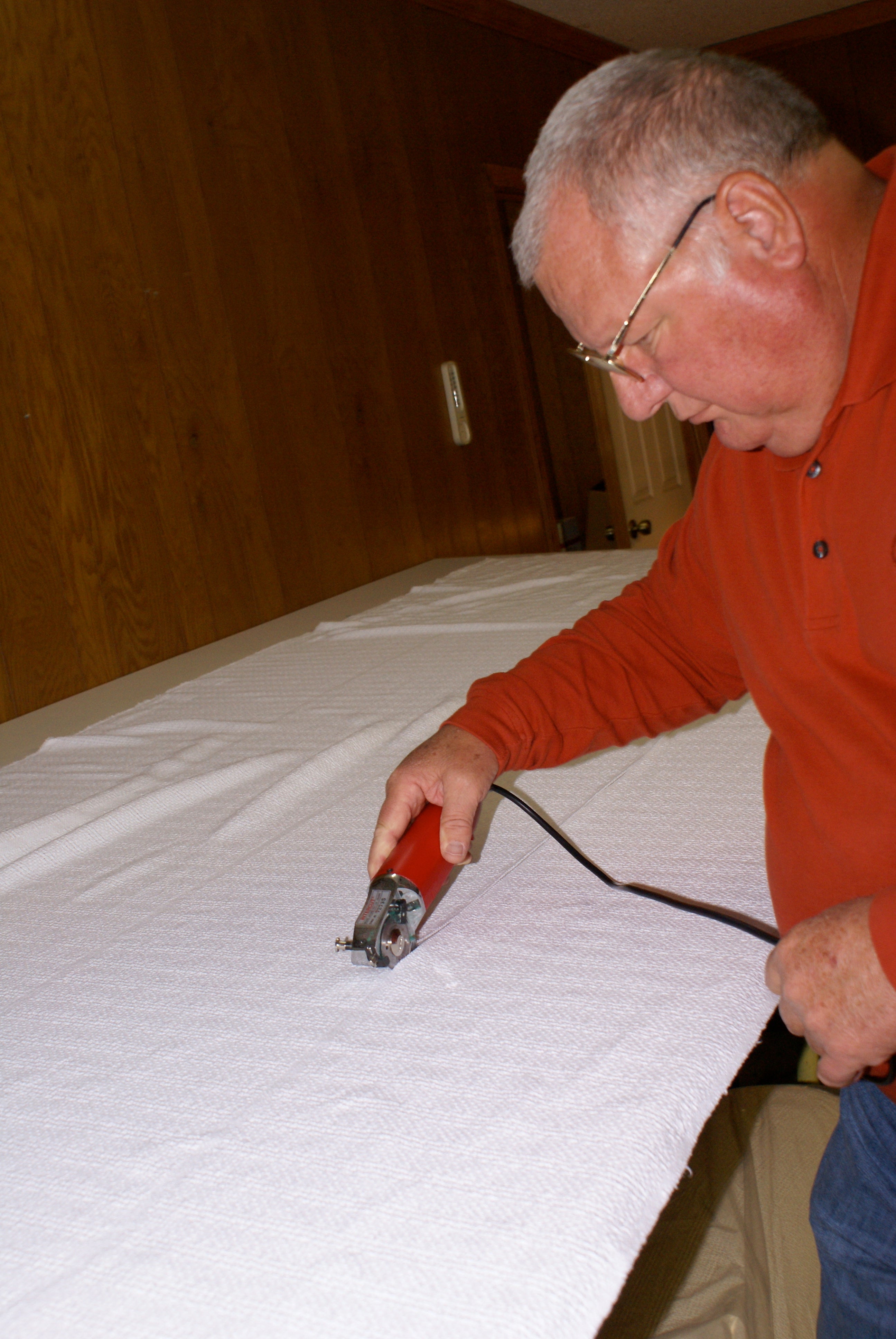 100% cotton dish cloths being cut for Lehmans.com