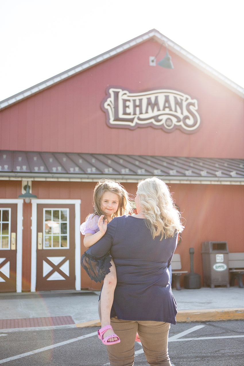 family walking into Lehman's store