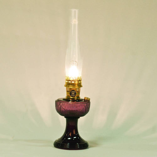 Handcrafted oil lamp with amethyst glass base and clear chimney, featuring a bright flame suitable for reading, perfect for Farm, Garden & Tool, Lamps & Lighting, Emergency Supplies, Oil Lamps, and Table Lamps collections.