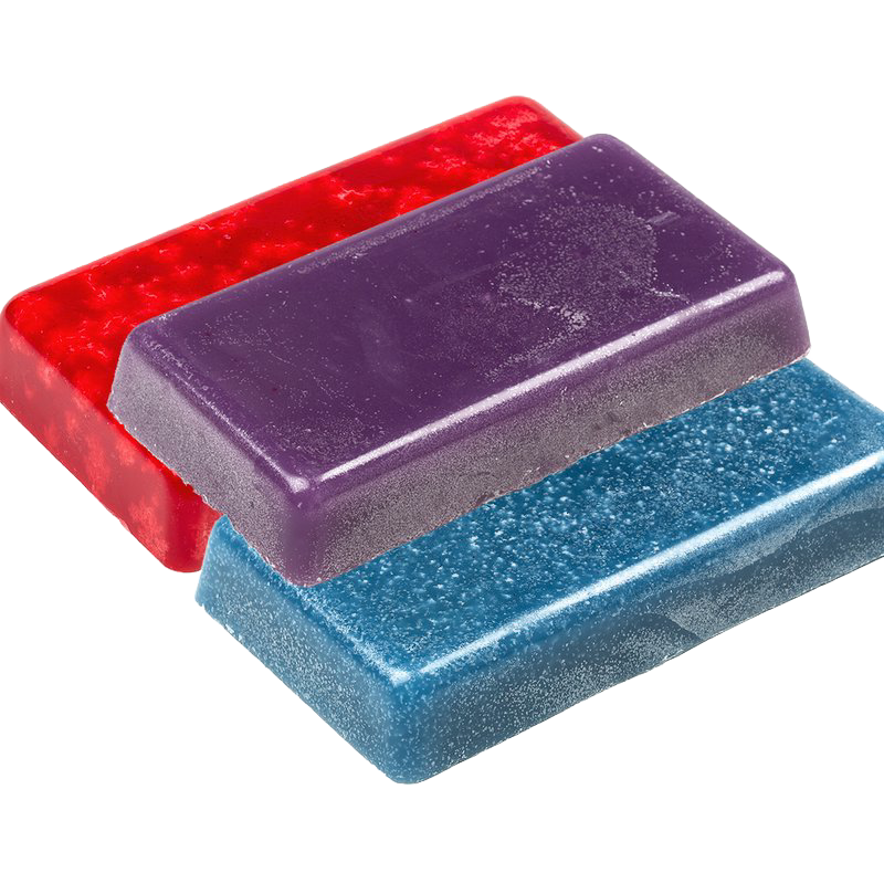 Three smooth blocks of colored scented candle wax in red, purple, and blue, handcrafted for candlemaking supplies and ideal for lamps and lighting collections.