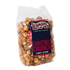 Clear bag of handcrafted caramel popcorn mixed with festive peppermint candies and chocolate pieces, labeled Christmas Crunch, ideal for Kitchen & Food, Snacks and Sweets, Popcorn, and Best Sellers collections.