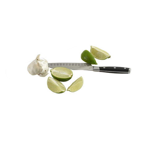 Professional kitchen knife with a black handle lying beside fresh lime wedges and a garlic bulb, ideal for food prep and kitchen gadget collections.