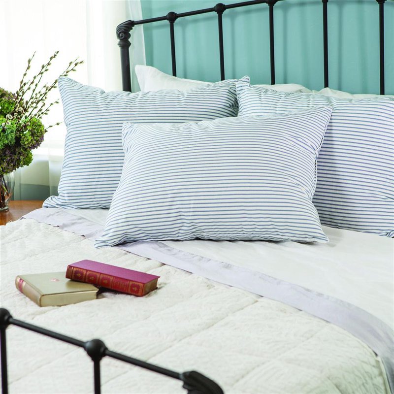 Set of soft, handcrafted white and pale blue striped pillows generously filled with premium down, arranged on a bed with an iron headboard in a cozy bedroom setting, featured in Home & Decor, Home Textiles, Best Sellers, and Promo Eligible collections.