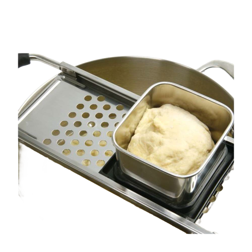 Handcrafted spaetzle maker with stainless steel grater and square hopper holding dough, designed for easy noodle preparation, ideal for Kitchen & Food, Cookware, Baking Supplies, and Best Sellers collections.