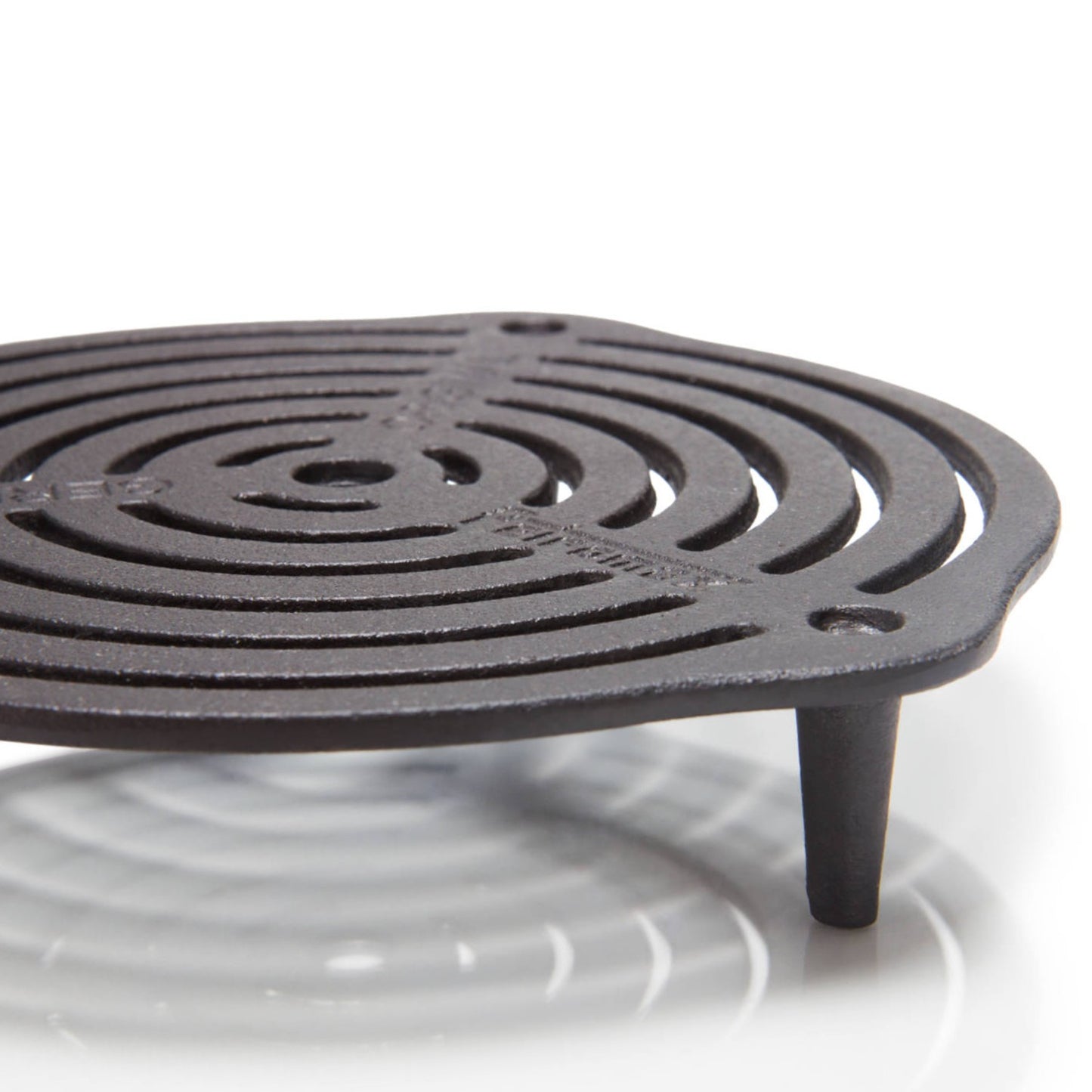 Round cast iron cooking grate with three short legs designed for elevated, even heat distribution, suitable for baking and roasting in Dutch ovens from Farm, Garden & Tool, Kitchen & Food, and Camping collections.