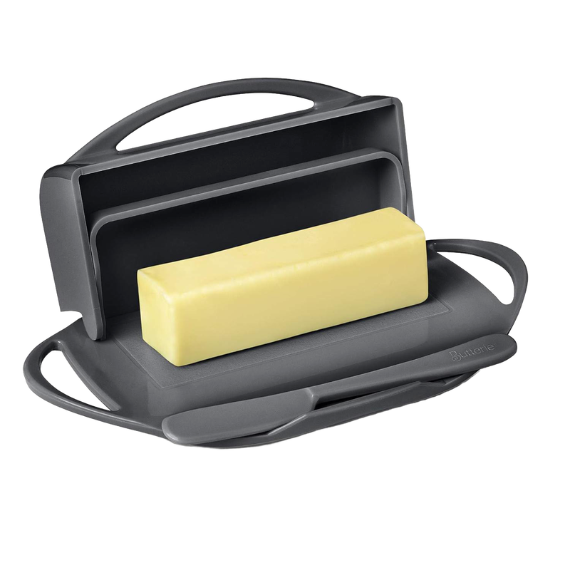 Dark gray flip-top butter dish holding a rectangular block of soft butter with a matching spreader resting on a built-in cradle, crafted for easy use and mess-free storage in Kitchen & Food and Kitchen Gadgets collections.