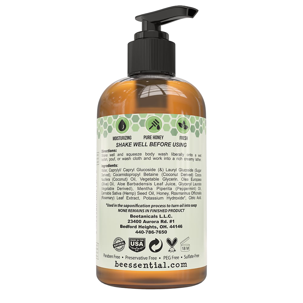 Back view of amber 8 oz pump bottle of natural body wash with detailed ingredient list, usage instructions, certification labels, and USA made in Ohio; featured in Health & Wellness, Soaps, and Best Sellers collections.