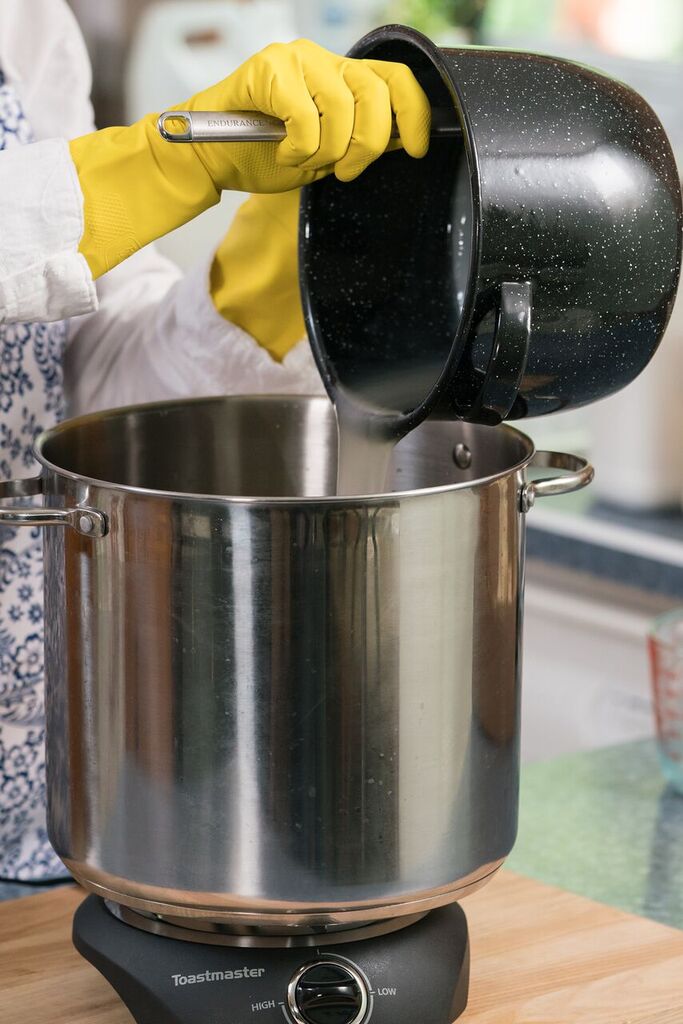 adding oils to big pot