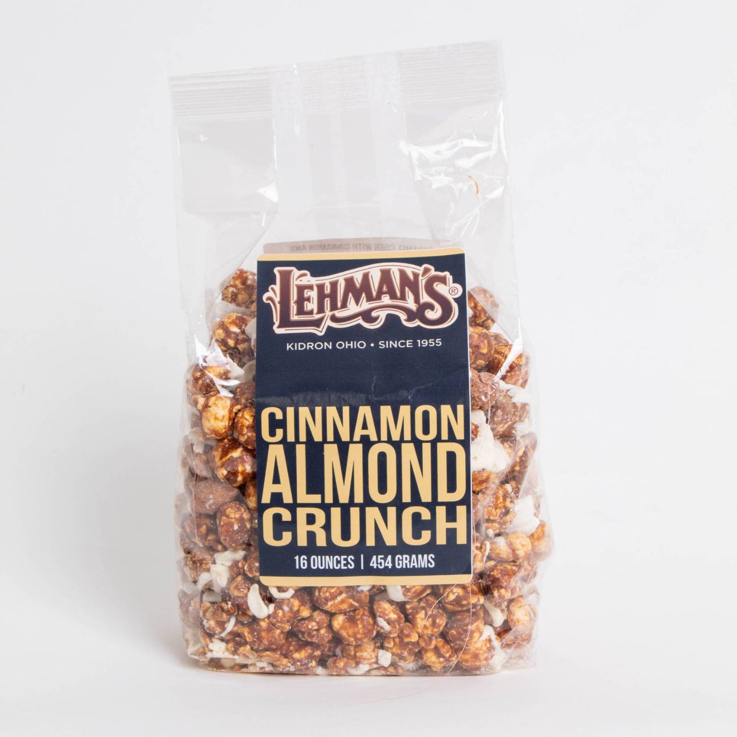 Clear bag of handcrafted cinnamon almond crunch popcorn, a unique sweet and crunchy snack made in USA, perfect for Kitchen & Food, Snacks and Sweets, Popcorn, USA Made, and Best Sellers collections.