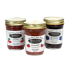 Three handcrafted glass jars of no sugar added homestyle jam in cherry, strawberry, and blueberry flavors, naturally sweetened with fruit juices, made in USA, perfect for Kitchen & Food and Promo Eligible collections.