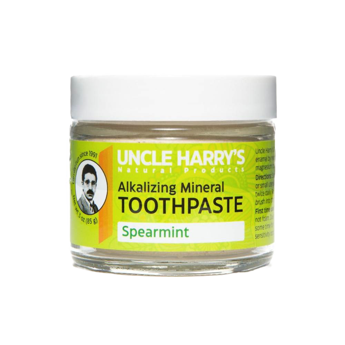 Handcrafted small glass jar of all-natural alkalizing mineral toothpaste in spearmint flavor with a bright yellow label and white lid, ideal for Health & Wellness, Grooming and Personal Hygiene, USA Made, and Best Sellers collections.