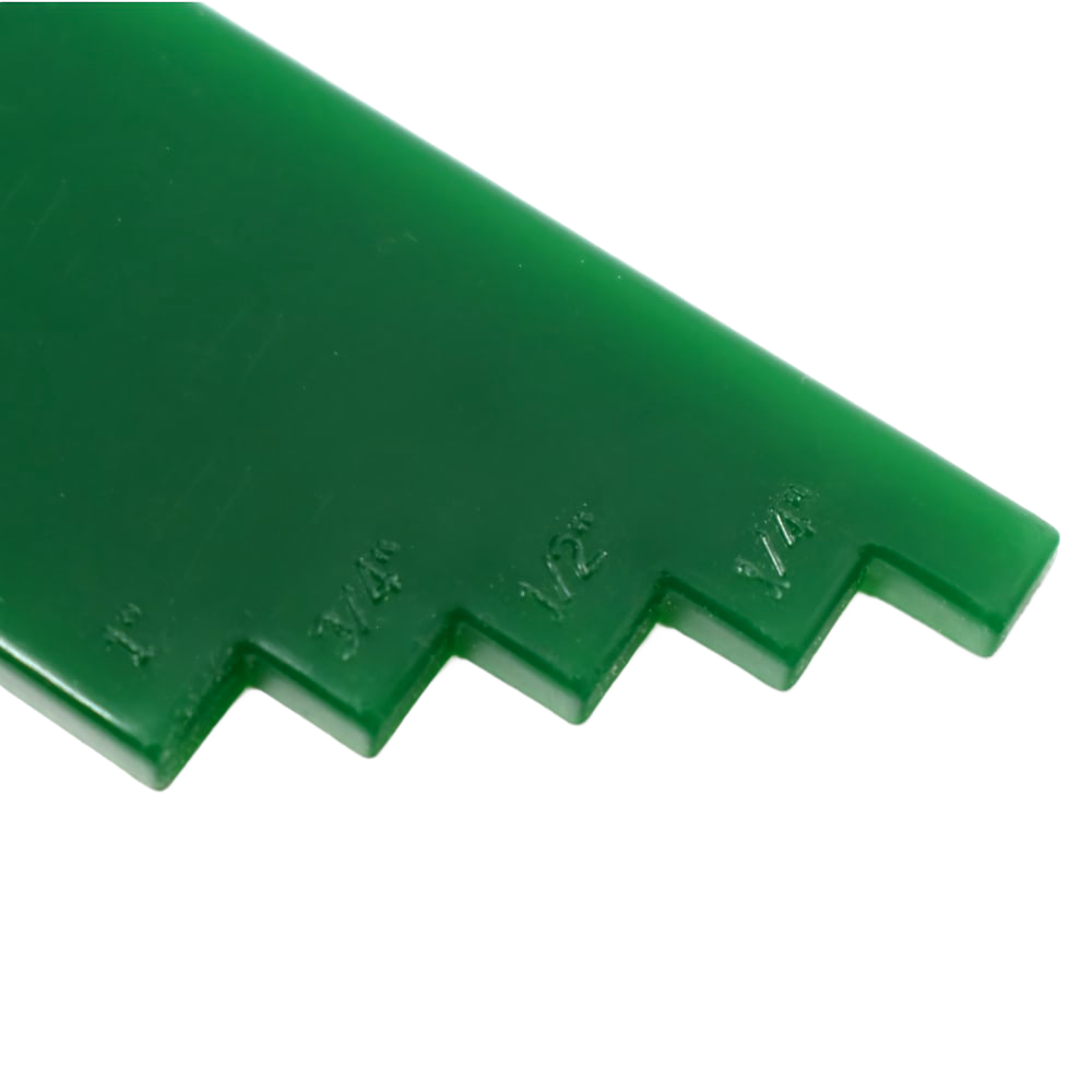 Close-up of a green handcrafted plastic lid lifter with measurement notches, designed for use in Kitchen & Food, Food Preservation, and Canning collections.