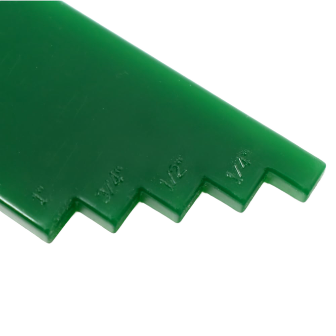 Close-up of a green handcrafted plastic lid lifter with measurement notches, designed for use in Kitchen & Food, Food Preservation, and Canning collections.