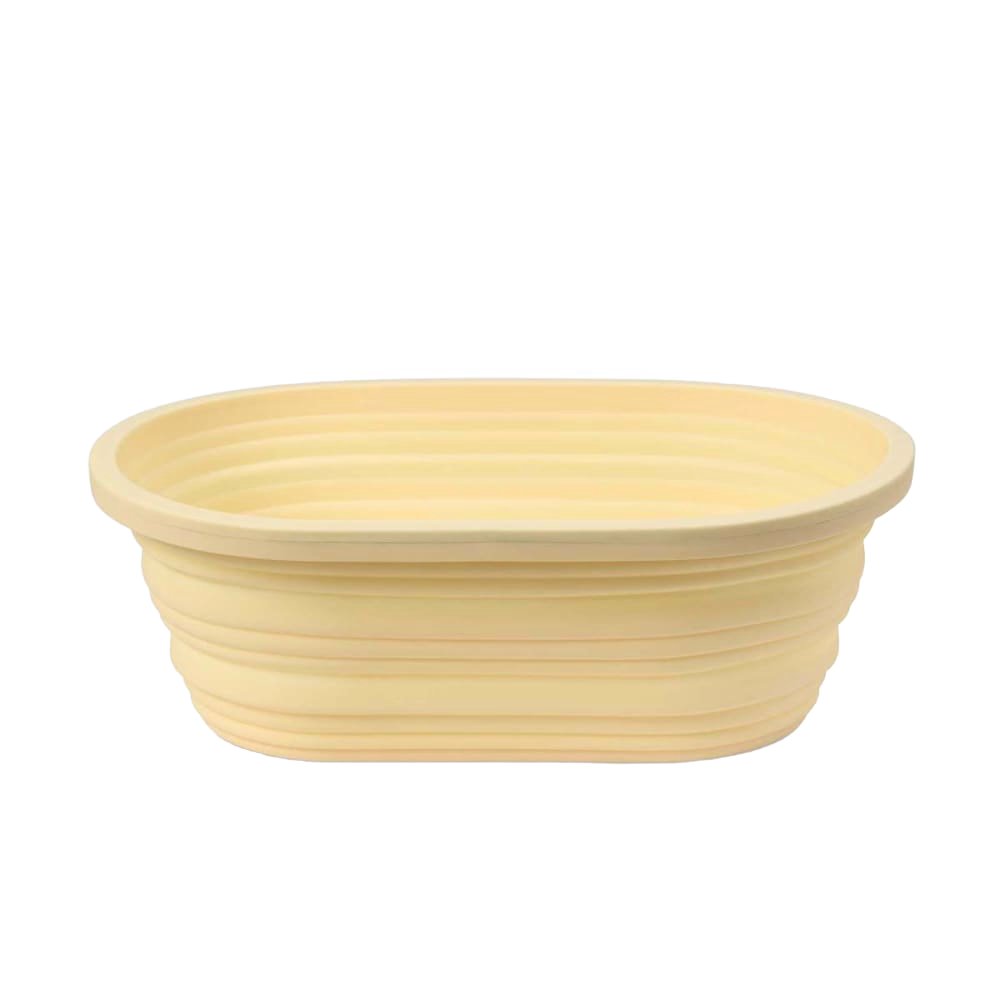 Light beige oval collapsible bread proofing basket made of durable silicone with steel rim, designed for easy dough rising and compact storage in Kitchen & Food and Baking Supplies collections.