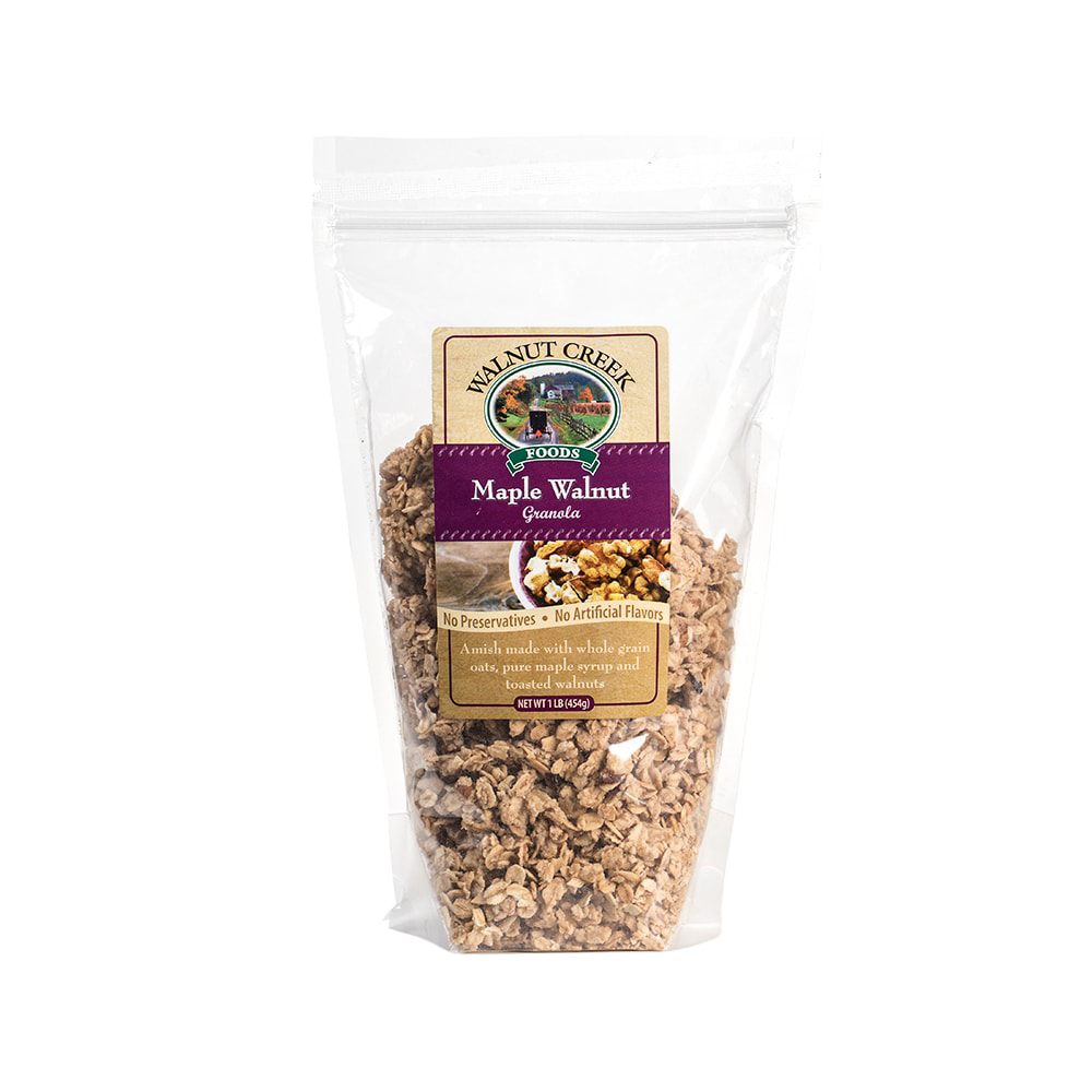 Clear resealable bag of handcrafted Amish-made granola with whole grain oats, maple syrup, and toasted walnuts, packaged in USA for Kitchen & Food and Snacks and Sweets collections.