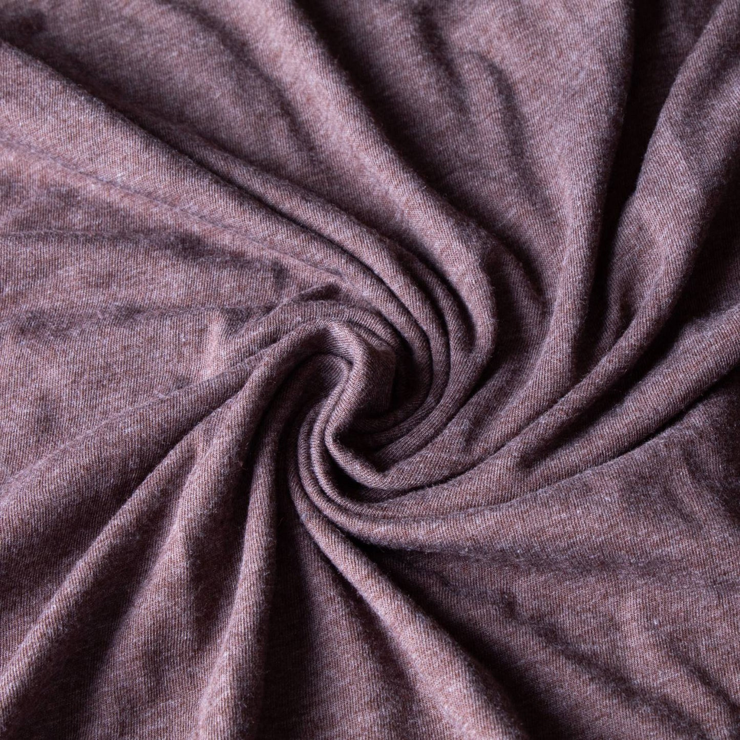 Close-up of soft, lightweight brown fabric with a subtle heathered texture, highlighting breathable material ideal for Health & Wellness, Clothing and Accessories, and Best Sellers collections.