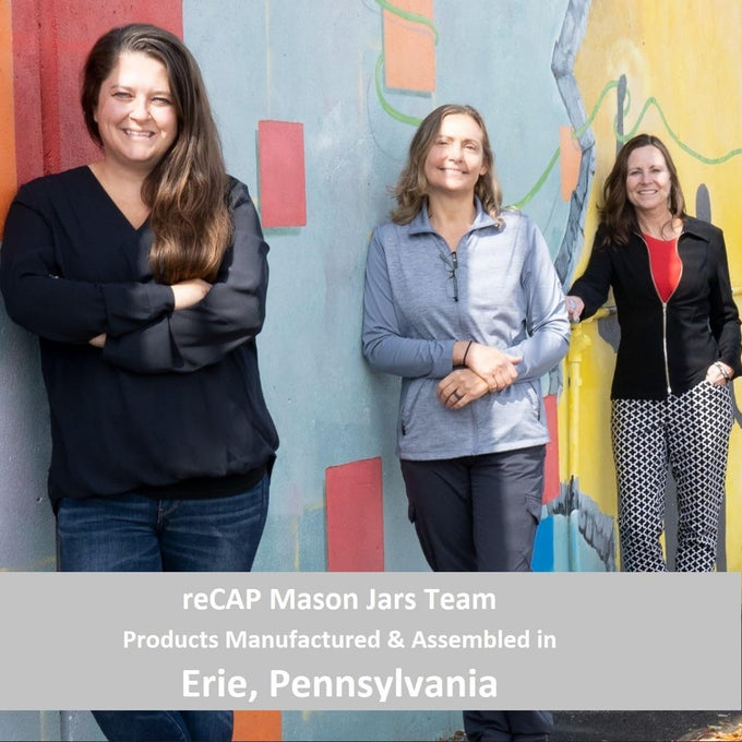 Three women standing together in front of a vibrant mural wall, representing the team behind USA-made kitchen gadgets and accessories featured in Kitchen & Food, Dinnerware, Kitchen Gadgets, Kitchen Accessories, USA Made, Best Sellers, and Promo Eligible collections.