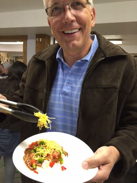 Lehman's President Galen Lehman is about to enjoy his haystack dinner.