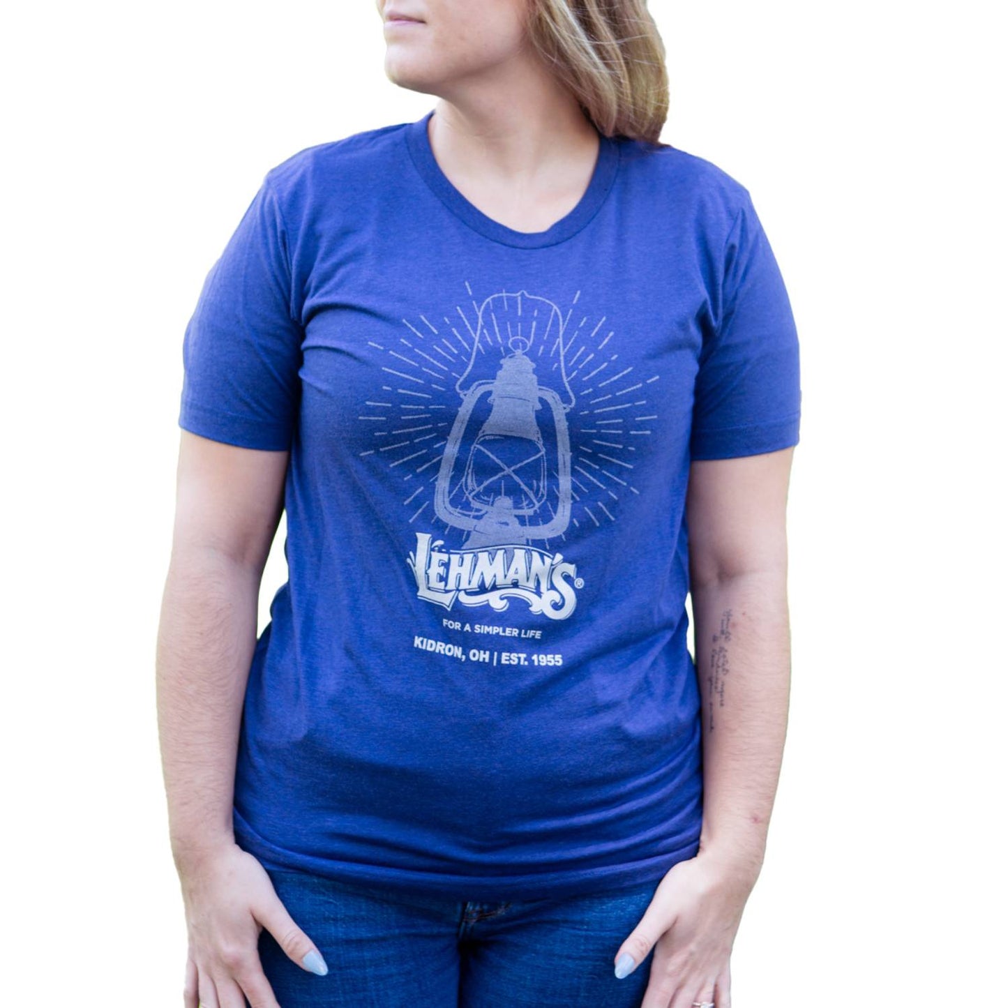 Unique handcrafted blue tee featuring a lantern graphic and "For a Simpler Life" text, designed for casual comfort in Health & Wellness, Emergency Supplies, and Clothing collections.