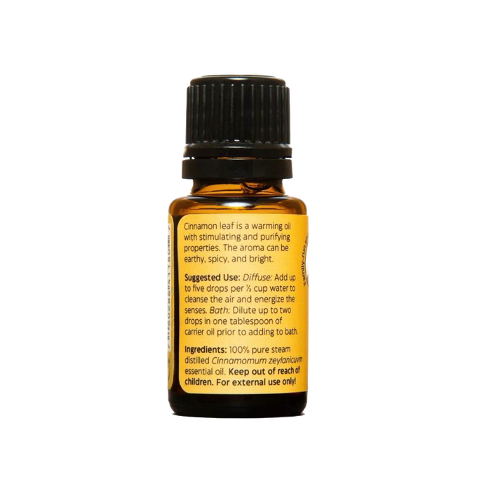 Amber glass bottle of handcrafted cinnamon leaf essential oil with black cap and detailed label, made in USA for aromatherapy, soapmaking, candlemaking, and health remedies.
