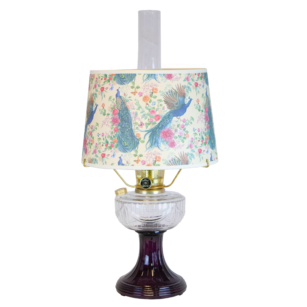Handcrafted amethyst glass oil lamp featuring a clear glass font and a decorative peacock-patterned shade, part of Lamps & Lighting, Oil Lamps, and Table Lamps collections.