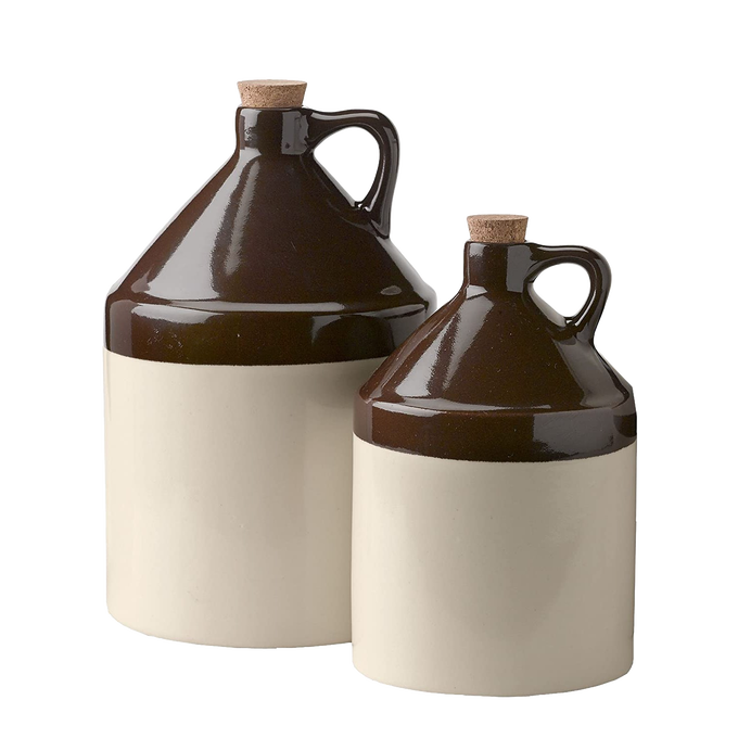 Pair of handmade stoneware jugs with handles and cork stoppers in brown and cream glaze, crafted in USA, perfect for Kitchen & Food, Storage and Serving, Best Sellers, and Promo Eligible collections.