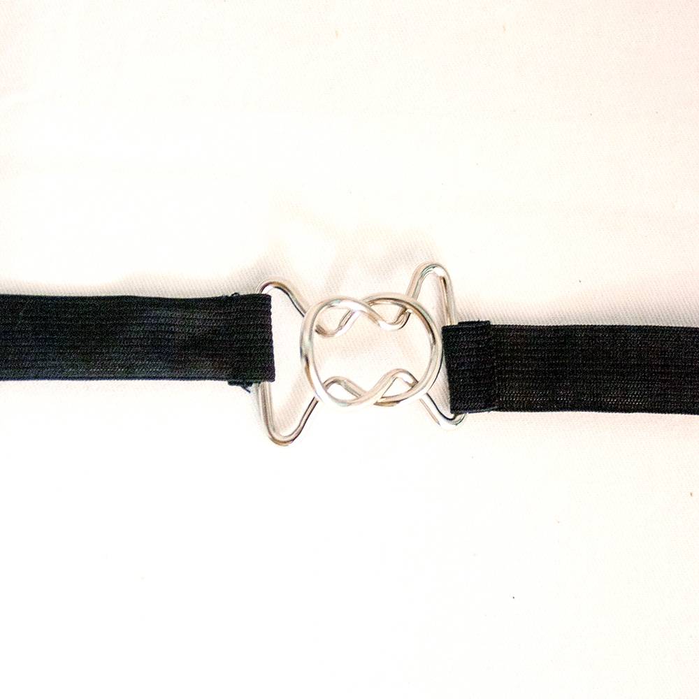 Close-up of a silver-toned metal clasp interlocking two ends of a black elastic strap, designed to secure an outdoor air conditioner cover, featured in Home & Decor and Best Sellers collections.