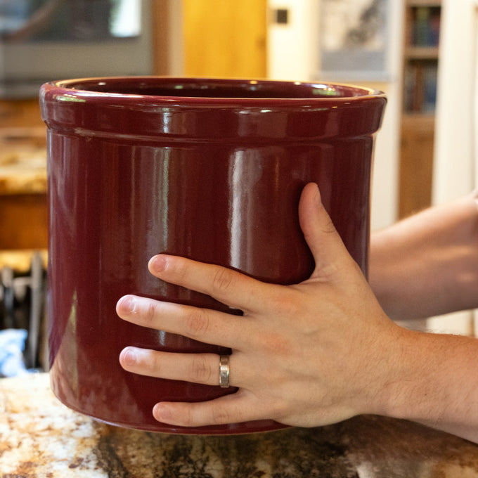 Handcrafted 2-gallon stoneware crock in rich red with smooth, lead-free, food-safe glaze, ideal for fermenting, pickling, and kitchen use, featured in Kitchen & Food, Food Preservation, Fermenting and Pickling, USA Made, and Best Sellers collections.