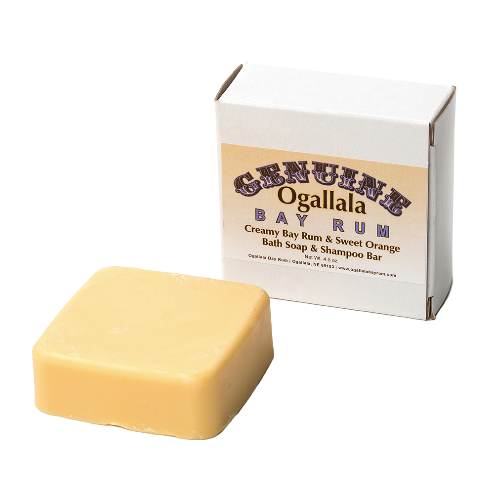 Two square handcrafted bath soap and shampoo bars made in USA, scented with bay rum and sweet orange, featured in Health & Wellness, Grooming and Personal Hygiene, and Best Sellers collections.